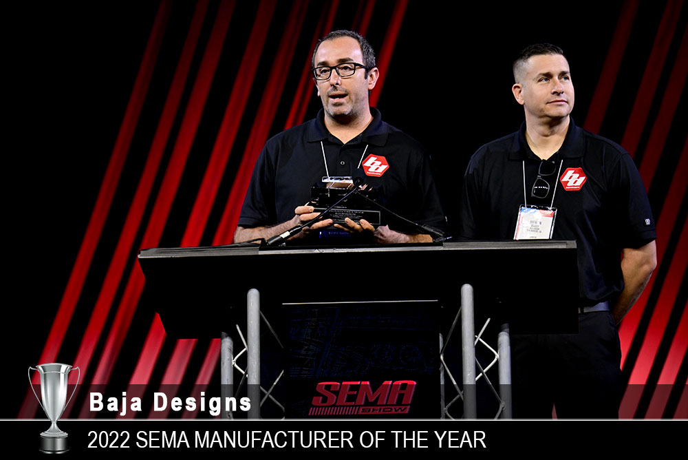 Baja Designs - 2022 Manufacturer of the year accepting award on stage
