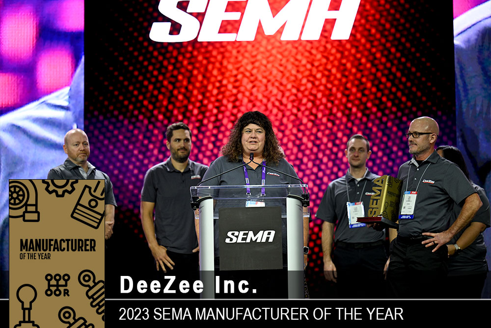 DeeZee Inc. - Manufacturer of the year accepting award on stage