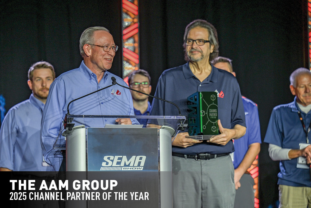 The AAM Group - Channel Partner of the year accepting award on stage