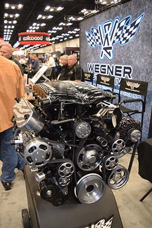 Engine with pulleys and belts in Wegner booth