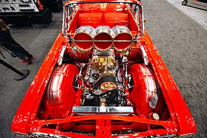 Engine with chrome components installed in red car