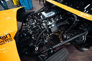 Side view of race engine from Westside Machine in yellow car