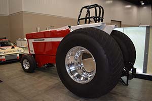 Red International tractor with large tires