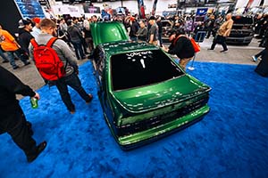 Rear view of green Ford Mustang