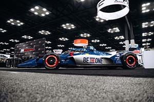 Ground view of blue and white IndyCar 