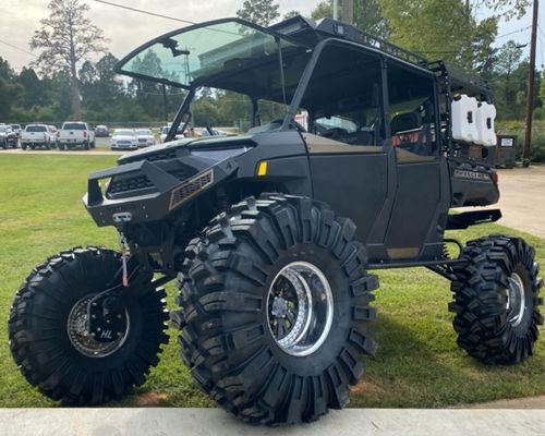 Thumper Fab 2022 Can-AM Defender parked on grass
